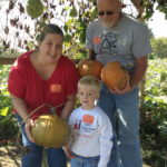 Field Trip Family Picking Pumpkins